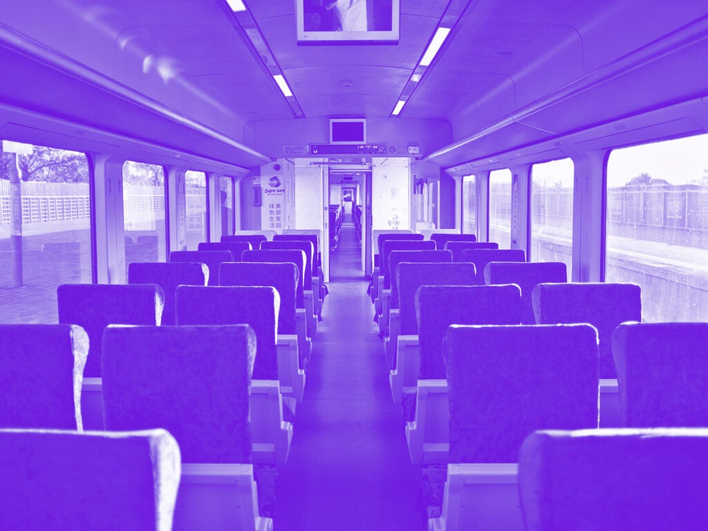 purple monochrome photo empty train