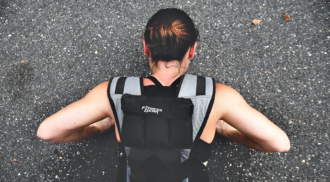 person in a weighted vest