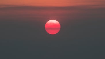 A red and orange sunset over San Francisco