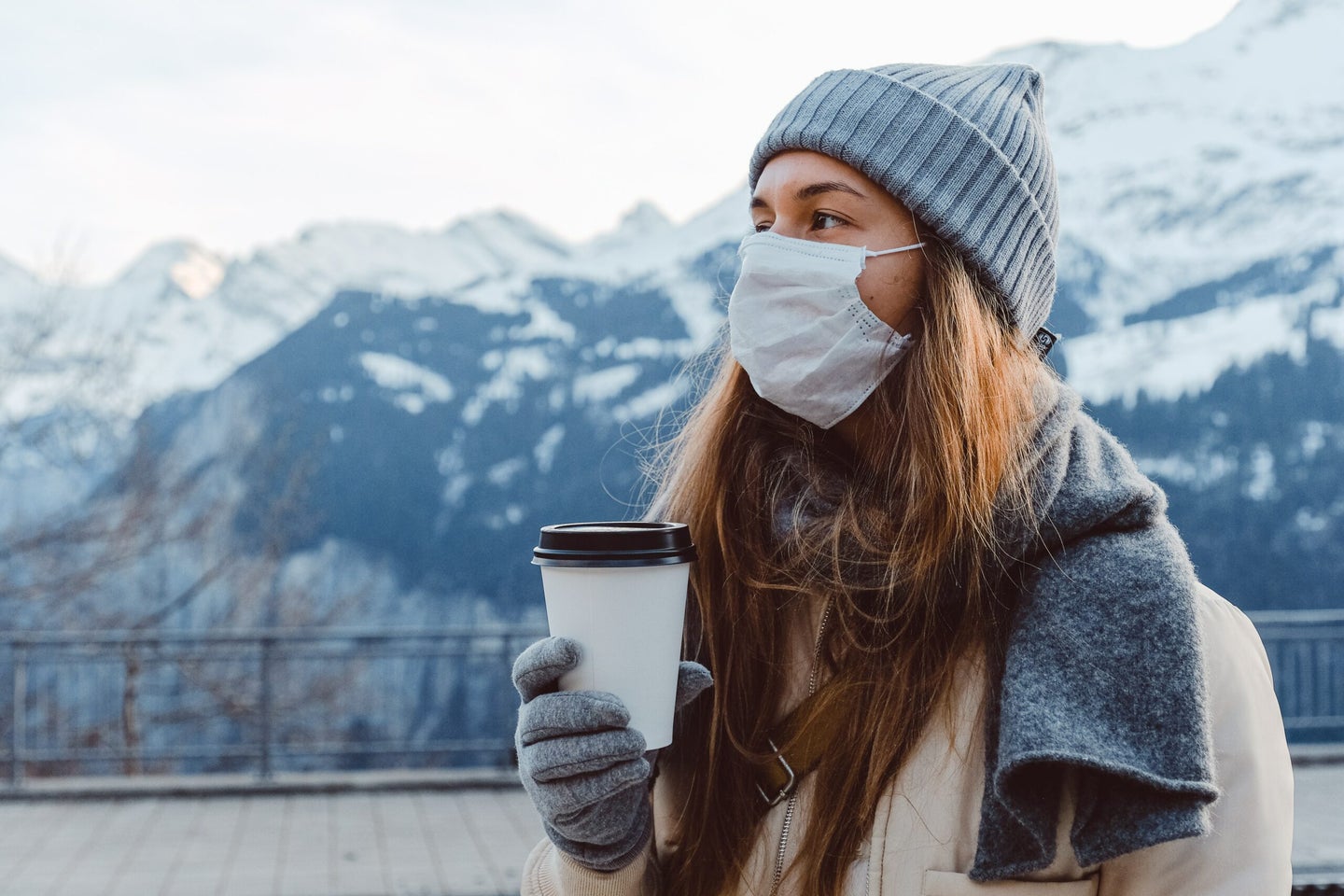 Woman in cold weather with mask.