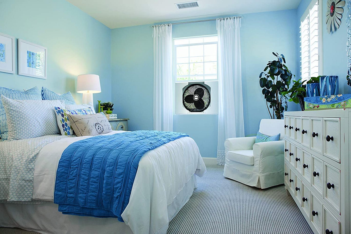 bedroom with a window fan