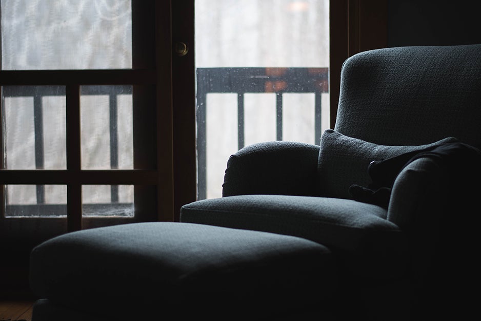 fabric armchair in the dark