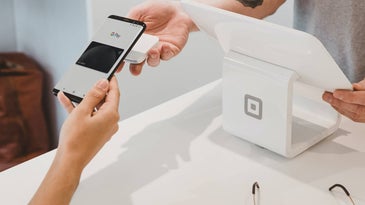 Person paying with phone