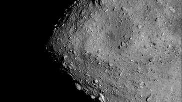 Bright rocks on Ryugu reveal the asteroid’s violent past