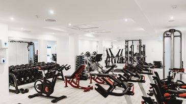 a gym full of exercise equipment