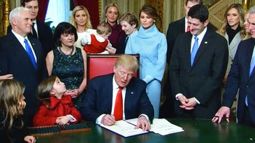 President Donald Trump signing an executive order in the White House in 2017