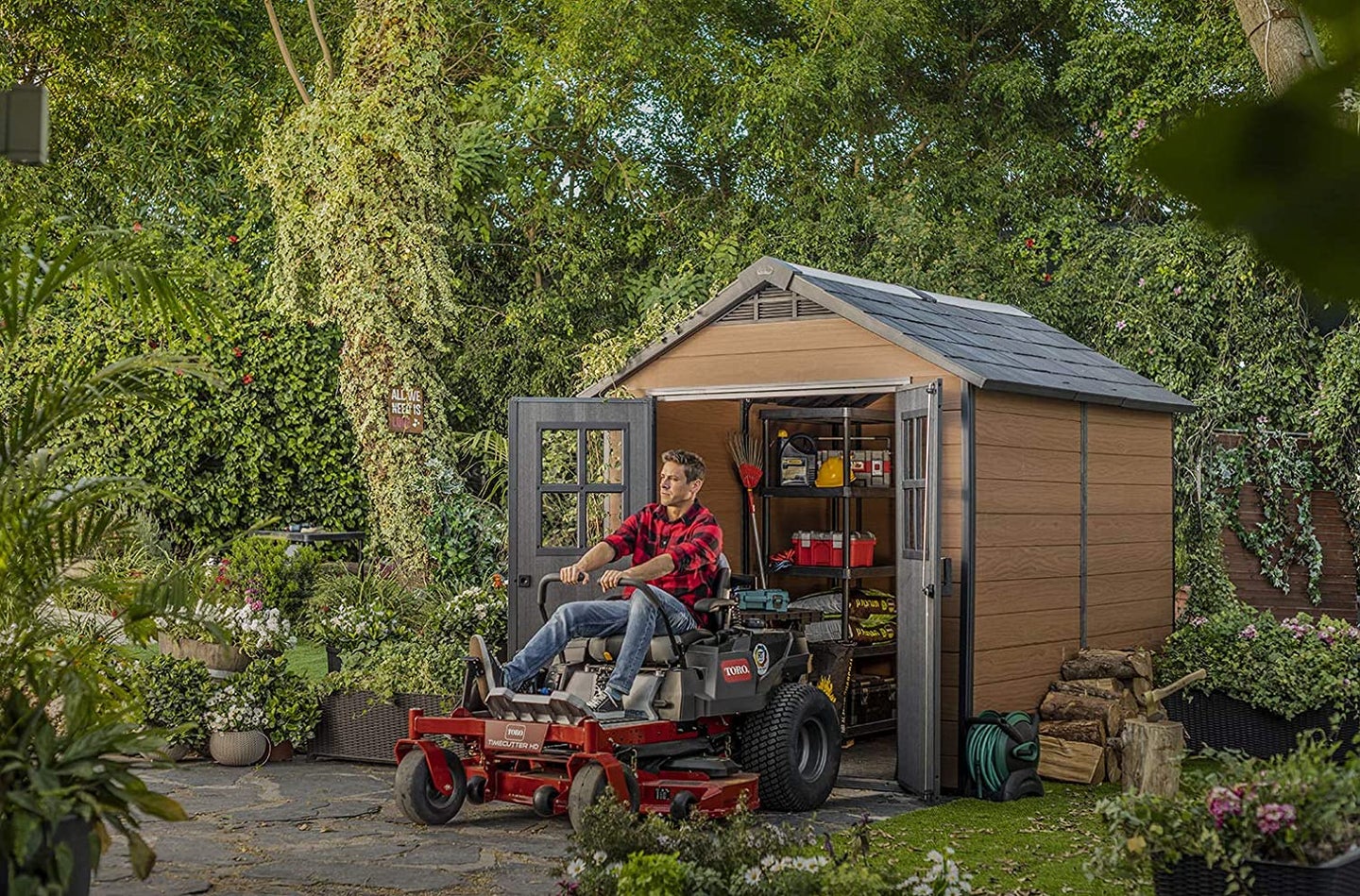 person driving out of a shed