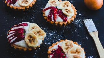 Little banana and chile tarts dusted with flour or sugar