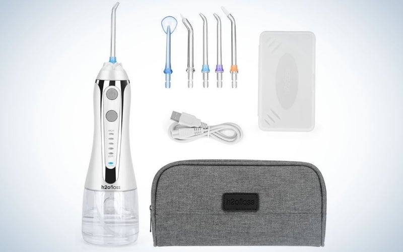 White, cordless water flosser with oral irrigator portable