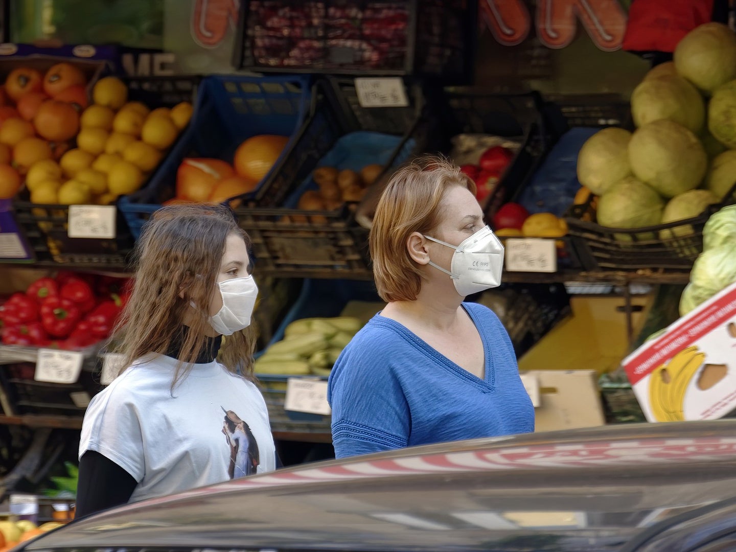 women wearing masks at the grocery store