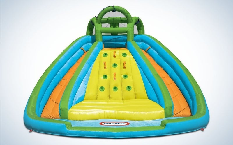 Colorful, rocky mountain river race inflatable slide bounce house