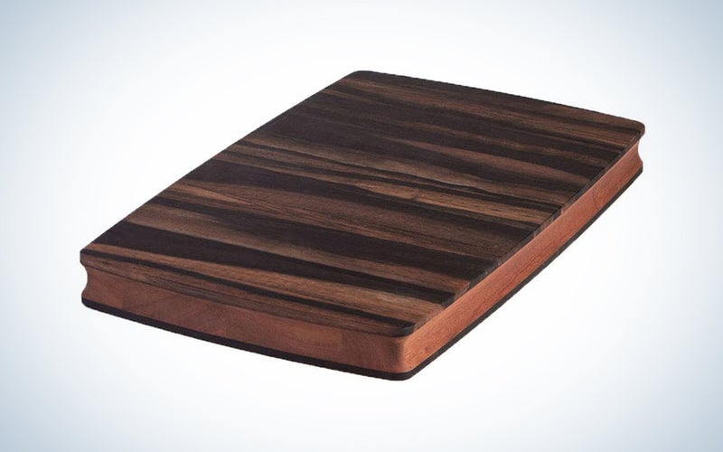 Stella Falone Reversible Cutting Board Made of Solid West African Crelicam Ebony Wood â 18'' x 11.4'' X 1.6'', Heavy-Duty, Premium Serving Board with Carved Grip Edge â Includes Conditioning Oil