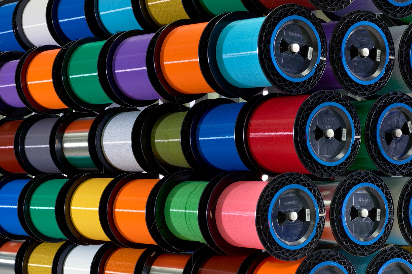 Colorful spools of fiber optic glass.