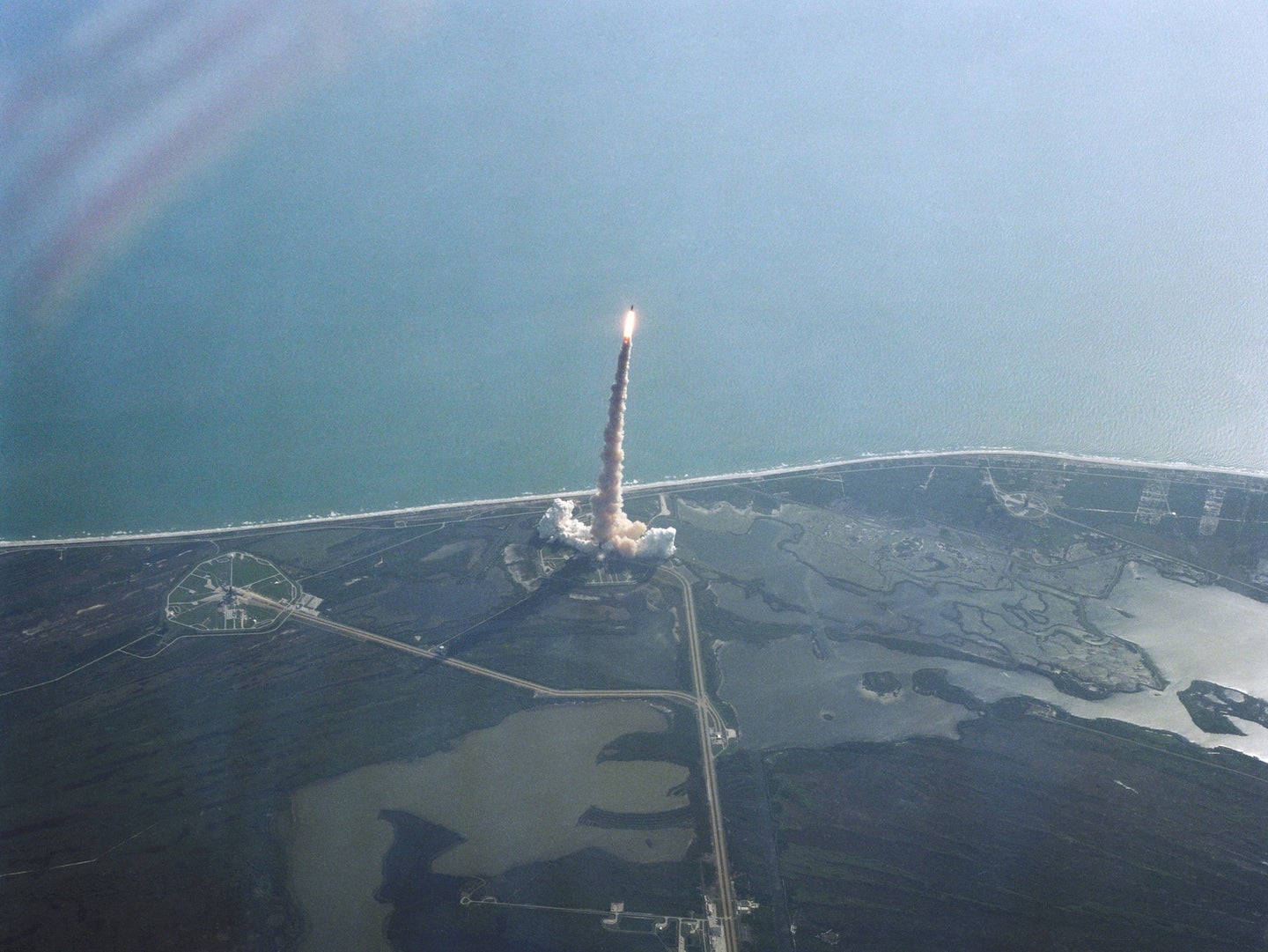 NASA space shuttle Challenger blasts off.