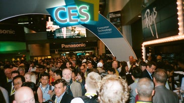 A crowd of people at the consumer electronics show.