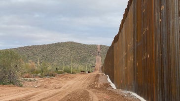 The Trump border wall made of concrete and steel on the edge of Organ Pipe Cactus National Monument in Arizona