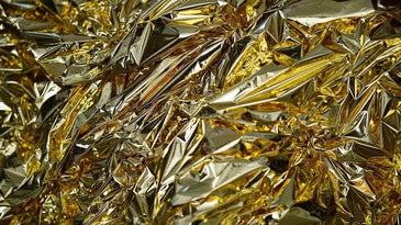 A gold-colored mylar emergency blanket.