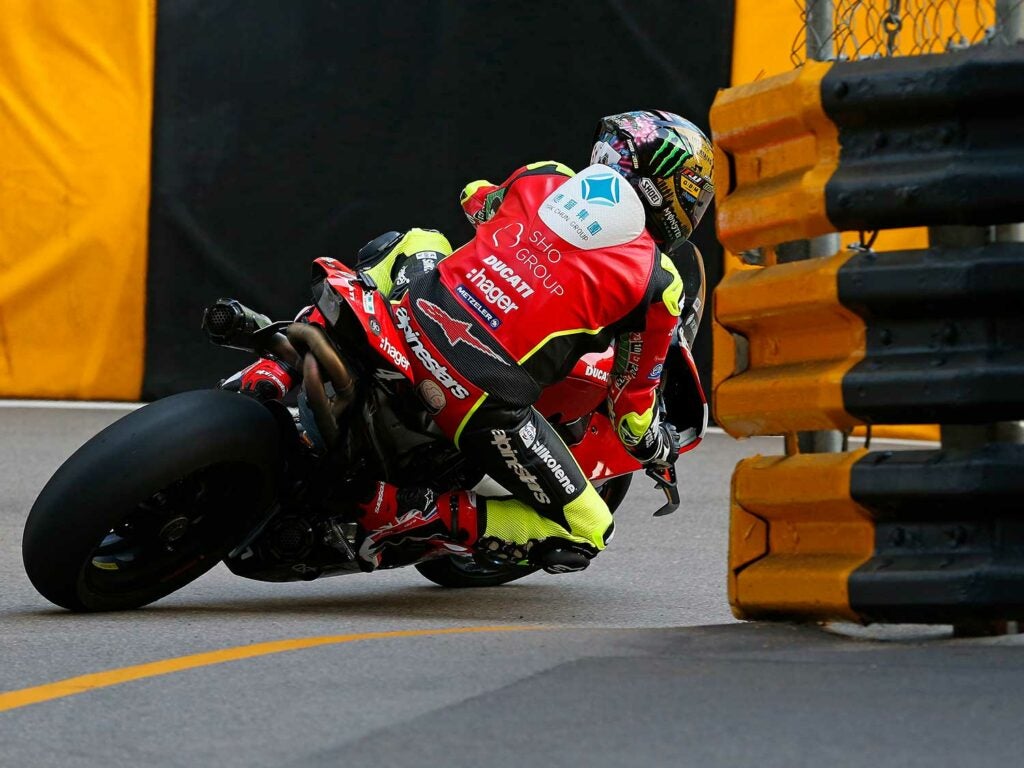 John McGuinness (PBM Ducati) between the walls and the barriers at the Melco Hairpin.