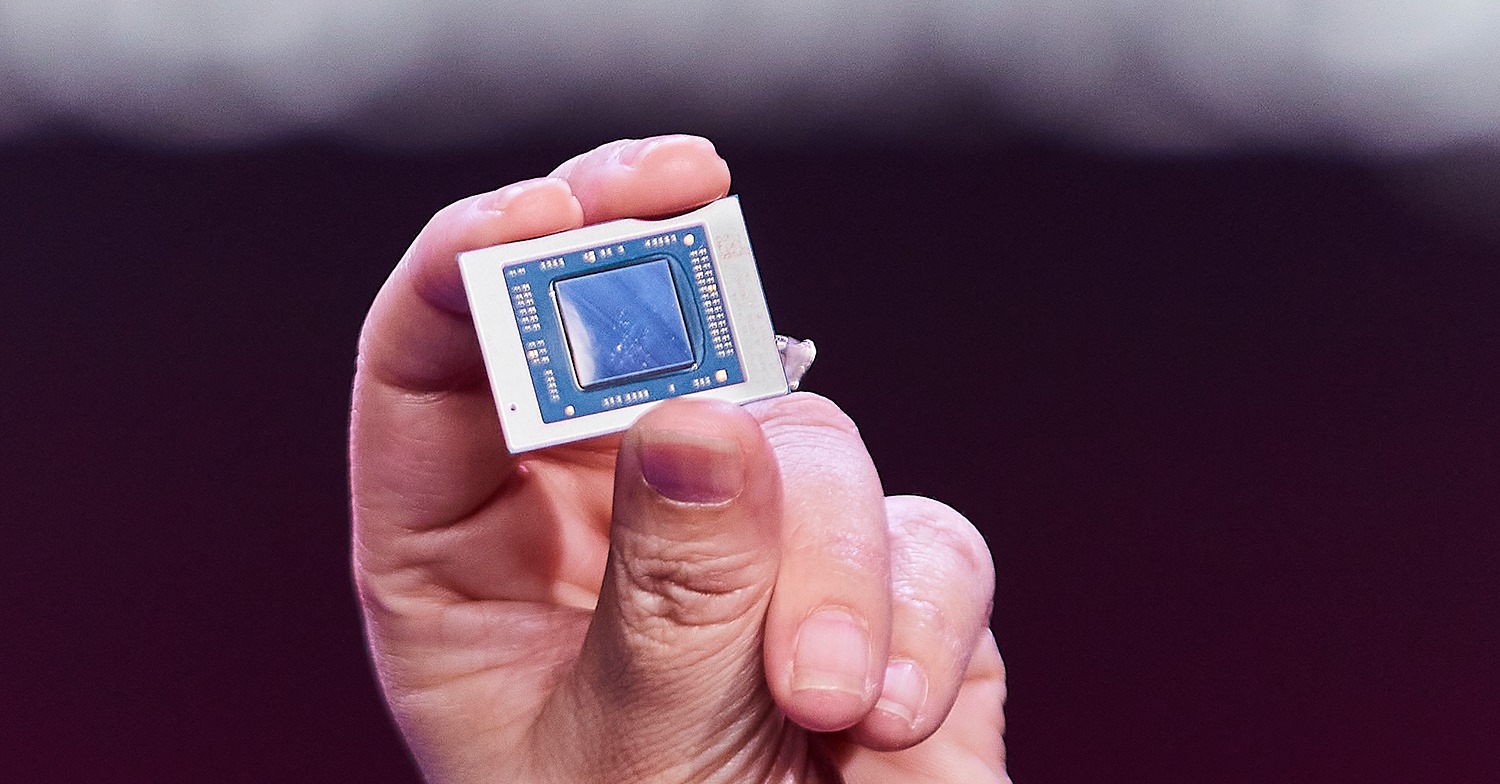 A hand holding the AMD Ryzen 5000 mobile processor at CES 2021.