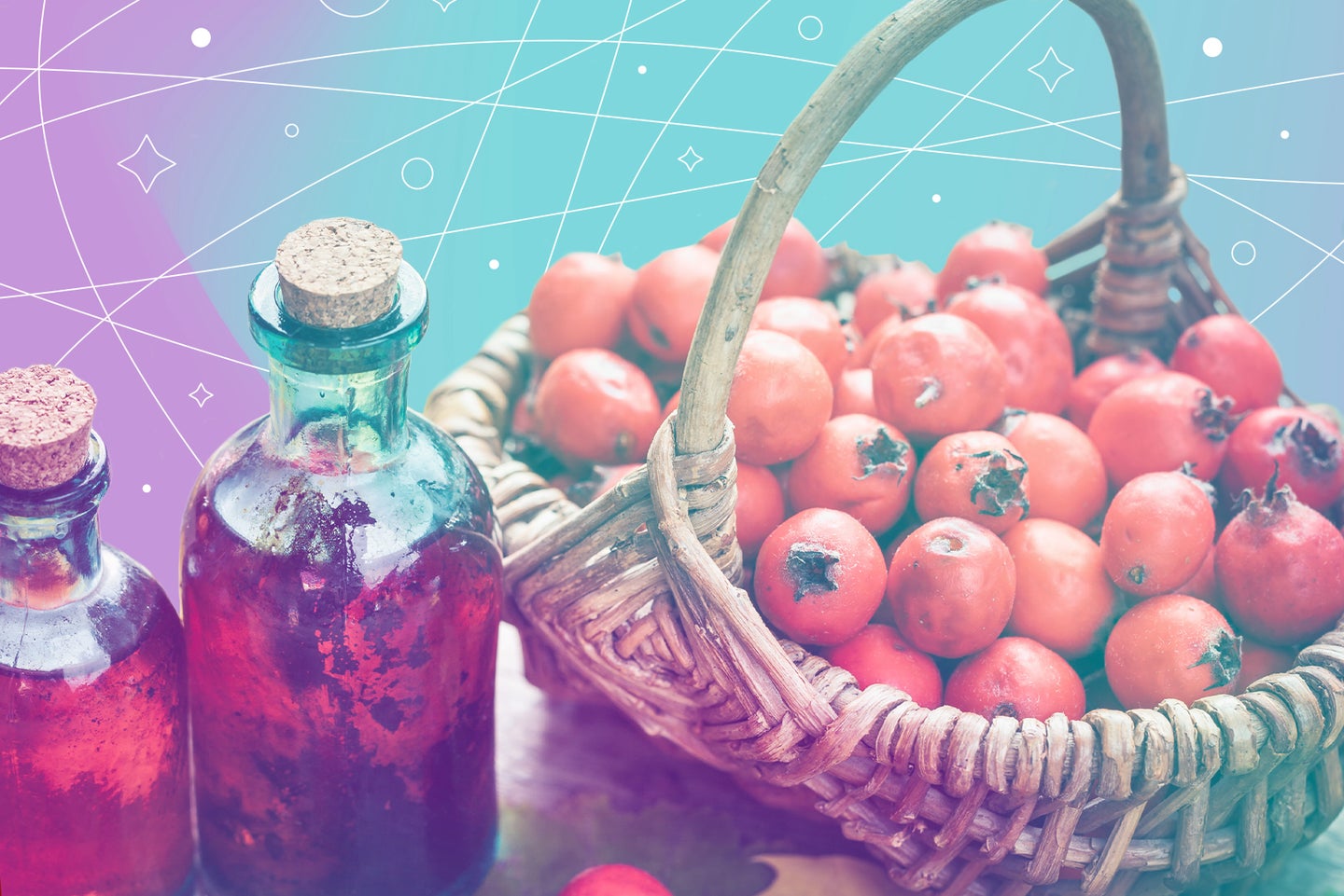 Basket of pomegranate fruits with glass bottles of tea on a light purple and seagreen background