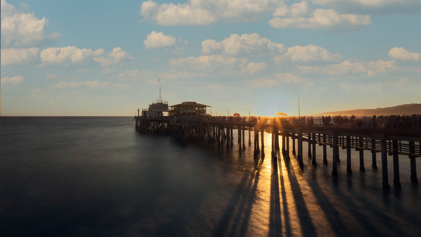 Badly edited photo of a pier during sunset
