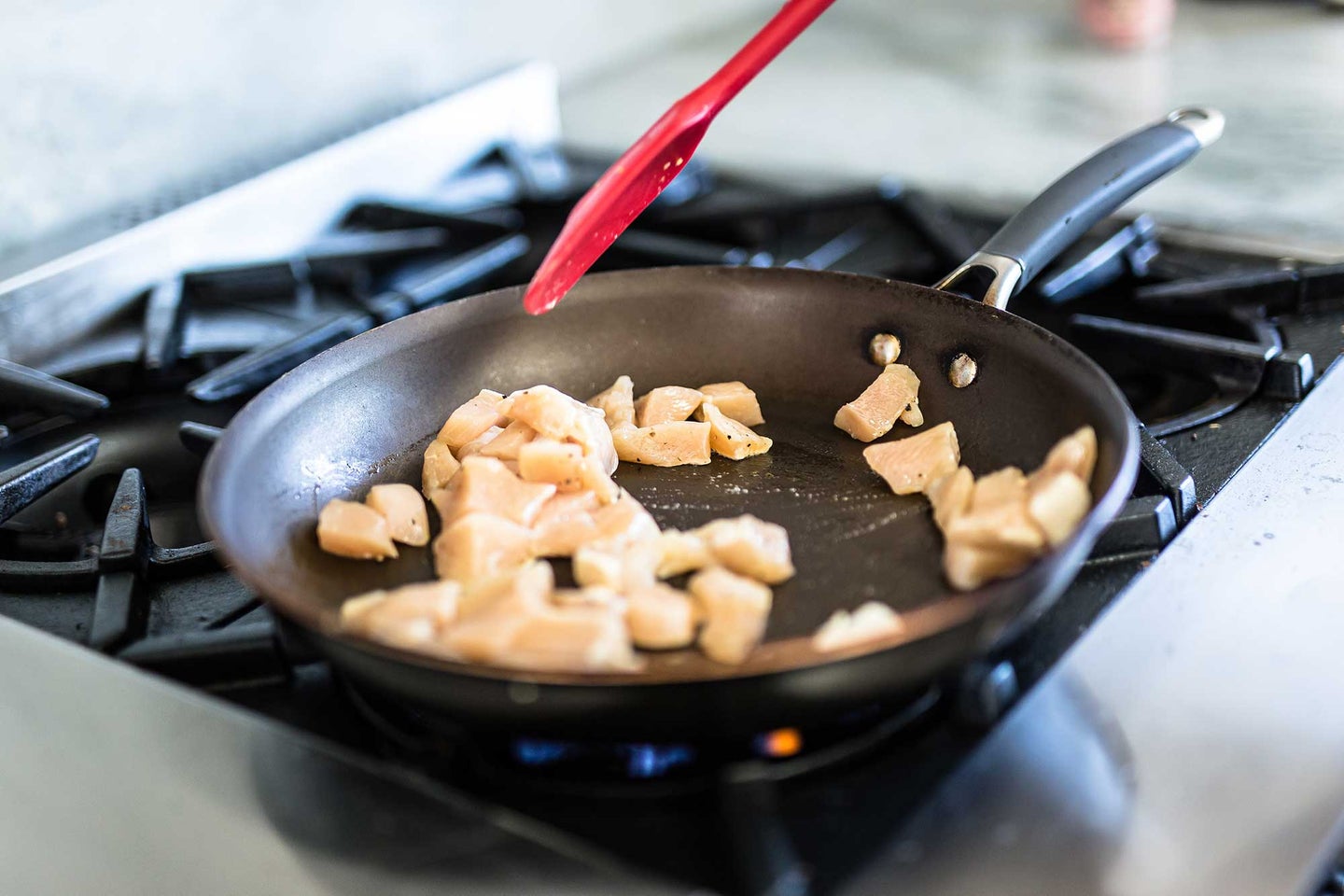 Stir fried chicken in a pan