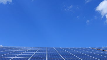 solar panels against a blue sky