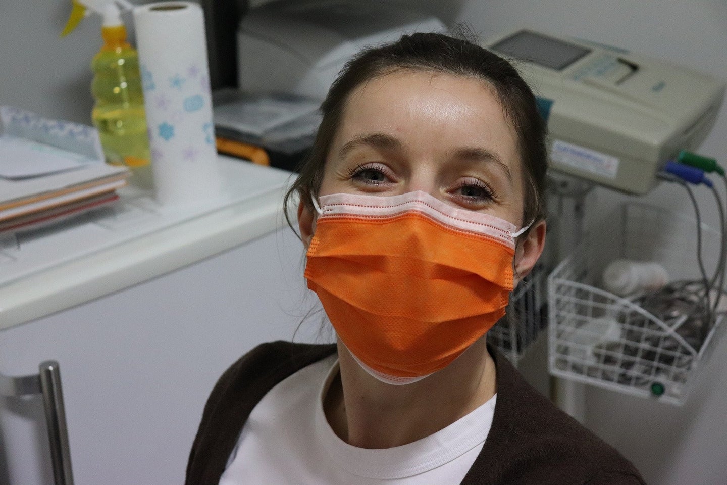 a healthcare worker wearing a surgical mask