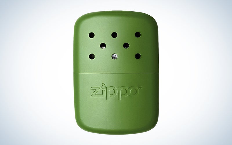 A green Zippo Hand Warmer on a plain background
