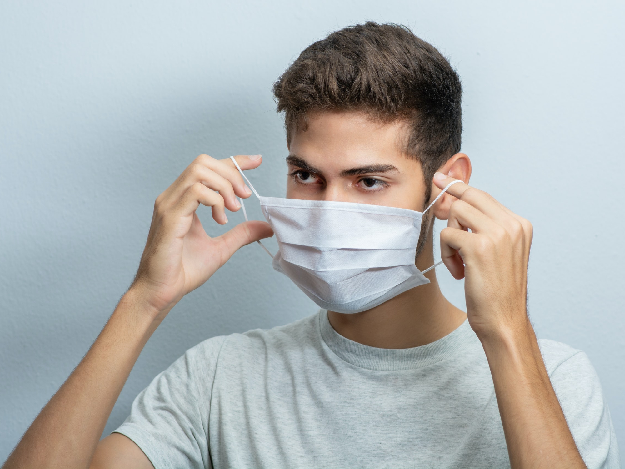 Why you shouldn't wear mask around your neck | Popular Science
