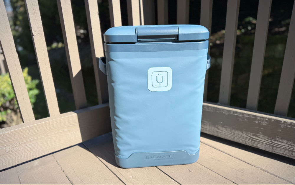 Brumate MagPack 24-Can Backpack Soft Cooler outside on a deck.