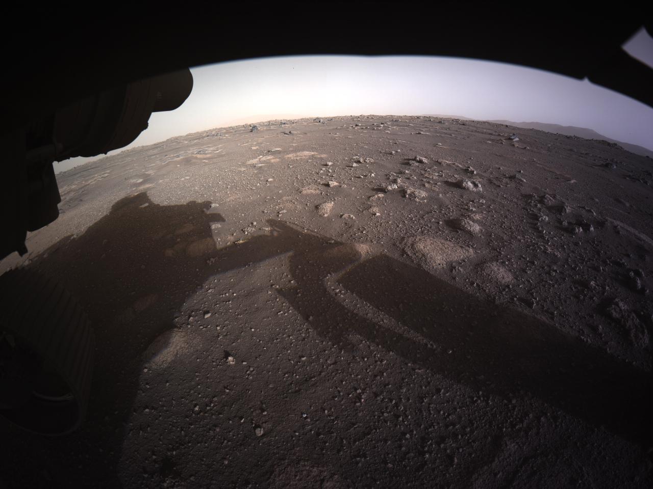 Mars' surface, in high-resolution and color, as captured by the Hazcams on NASA's Perseverance rover.