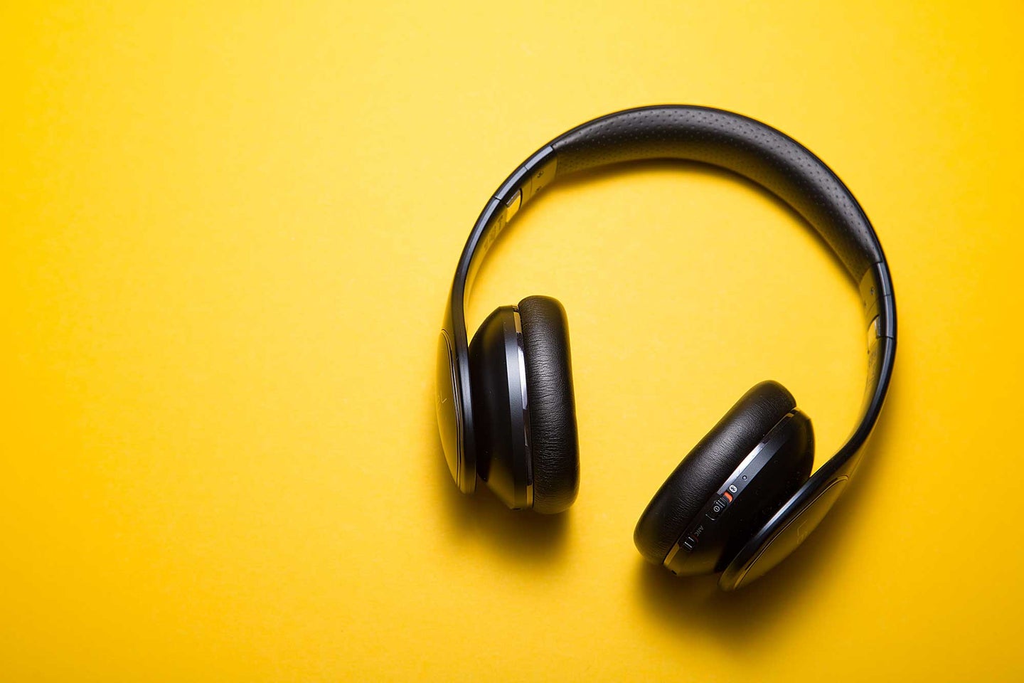 Headphones on yellow background