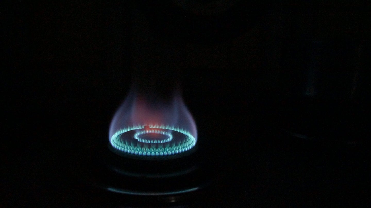 Natural gas stove lit up