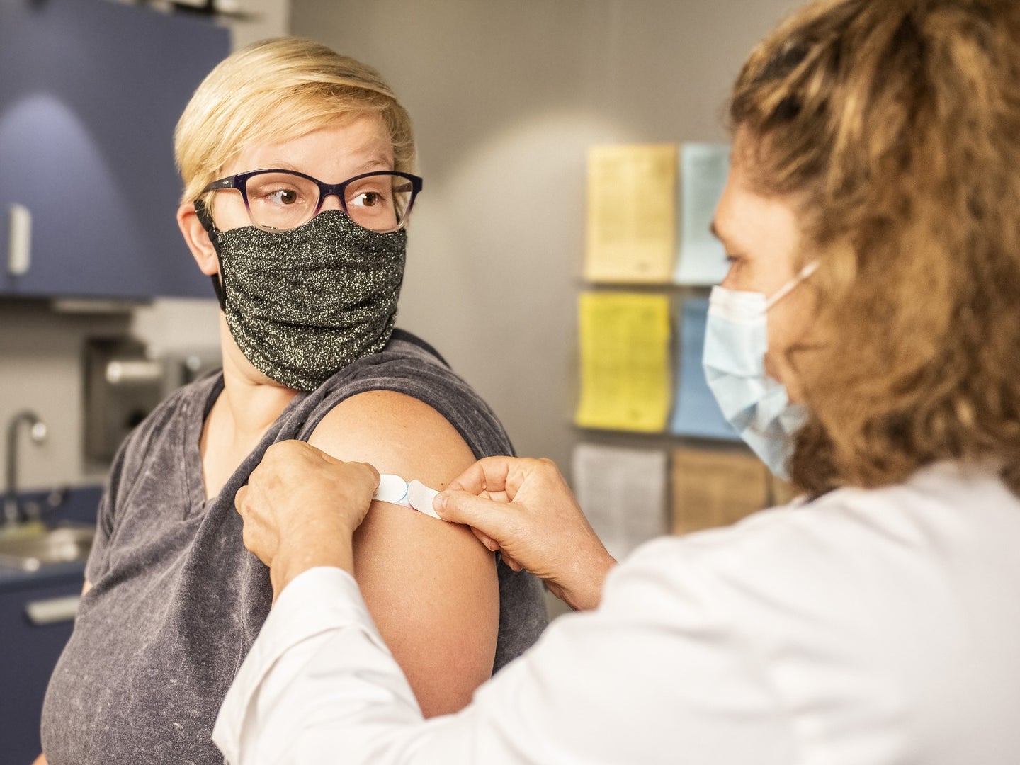 a person getting the COVID vaccine