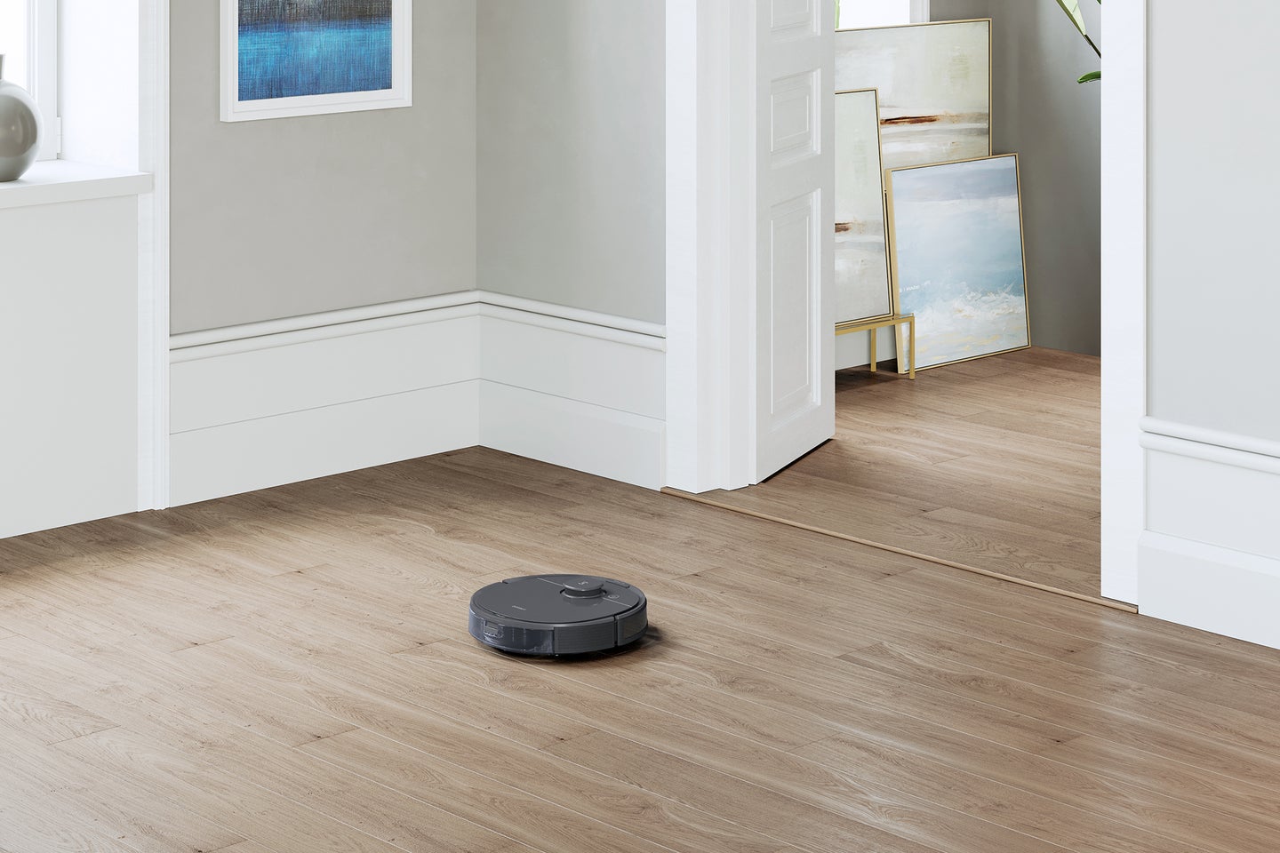 T8 Osmo vacuum and mopping robot on a wooden floor