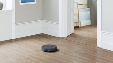 T8 Osmo vacuum and mopping robot on a wooden floor