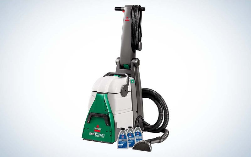 The Bissell Big Green Professional Carpet Cleaner has a green and white tank and a gray handle and tube.