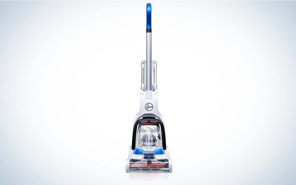 An upright vacuum, the Hoover PowerDash Pet Compact Carpet Cleaner against a plain background.