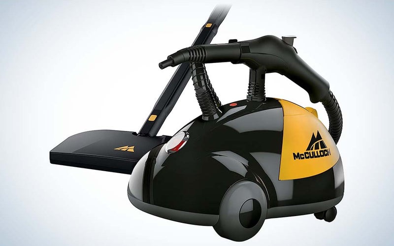 A black and yellow carpet cleaner known as the McCulloch Steam Cleaner that has wheels.