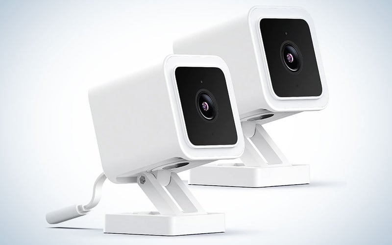 The Wyze Cam v3 2-pack on a blue and white background