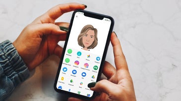 Person holding phone with avatar generator on screen