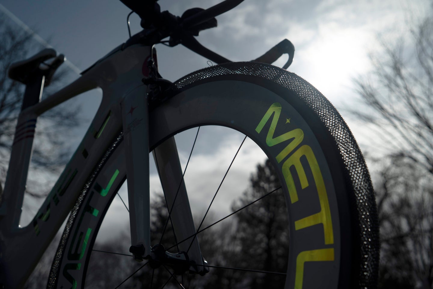 The METL bike tire on a bike with the sky in the background