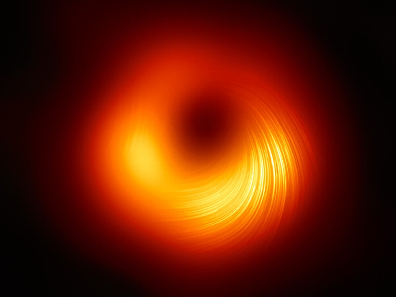 The first-ever image of the magnetic fields of a black hole.