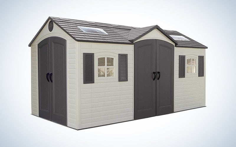 large grey and beige storage shed
