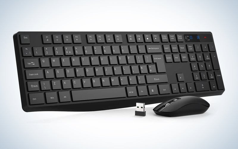 black wireless mouse with dongle and keyboard