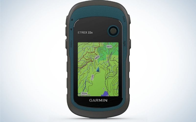A Garmin eTrex 22x navigator in the form of a black phone with a green screen with maps with routable roads and trails.