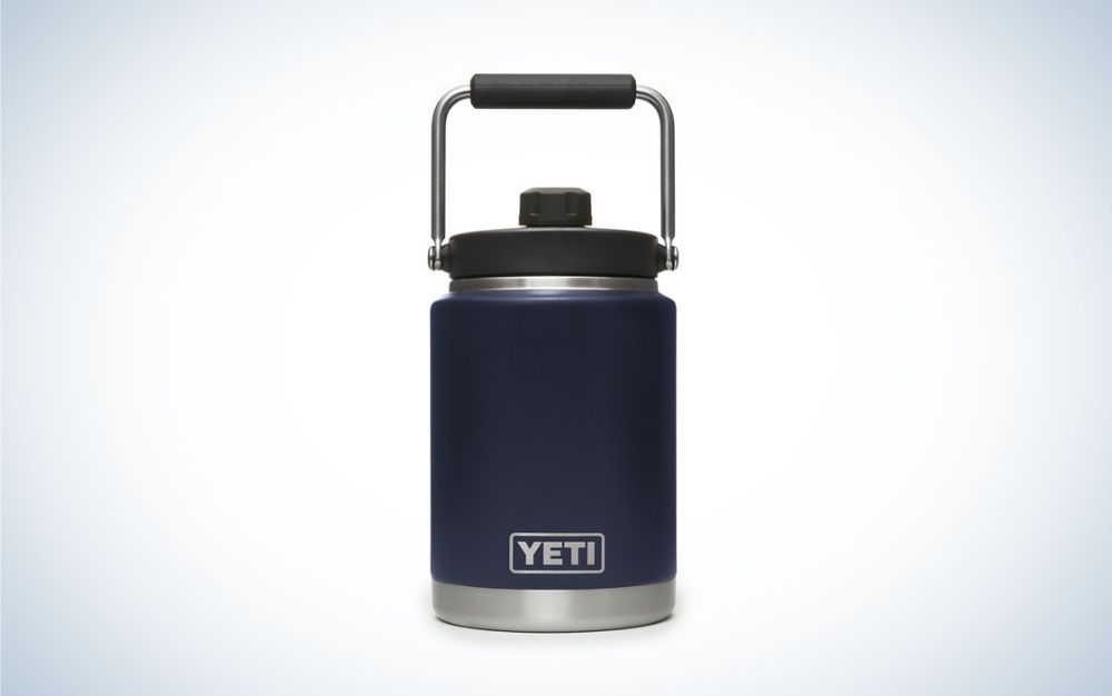 A cylindrical blue dark gallon with black lid cover.