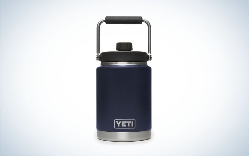 A cylindrical blue dark gallon with black lid cover.