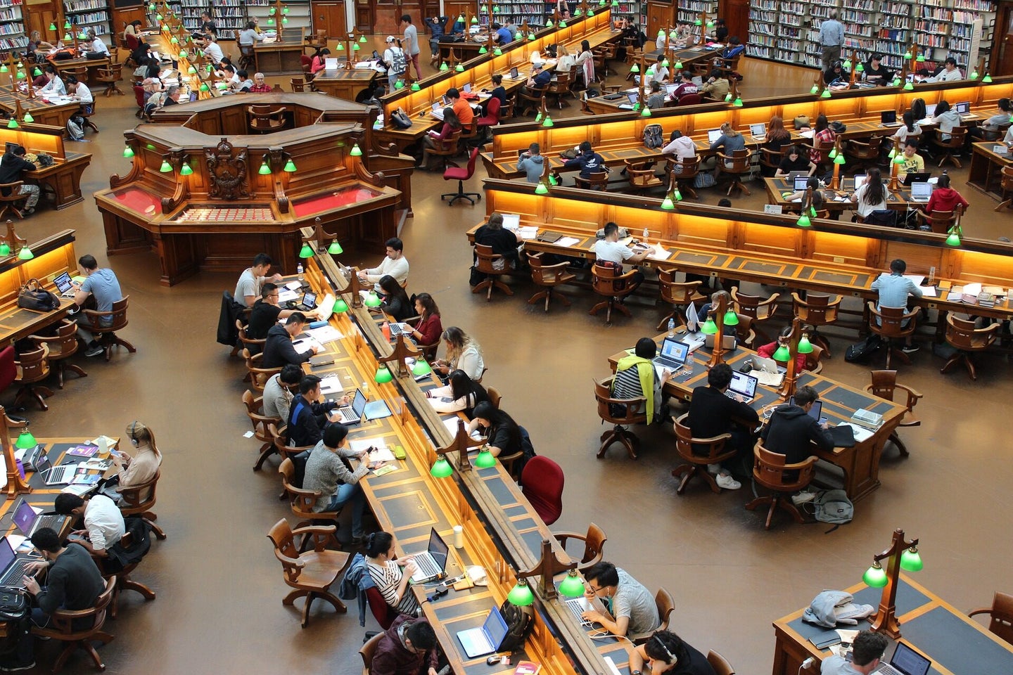 College students study in a hexagon-shaped library
